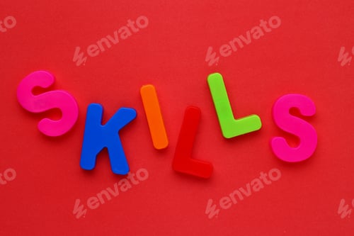 Preview: Text Made In Multicolored Magnetic Letters. Skills. Color Paper Background
