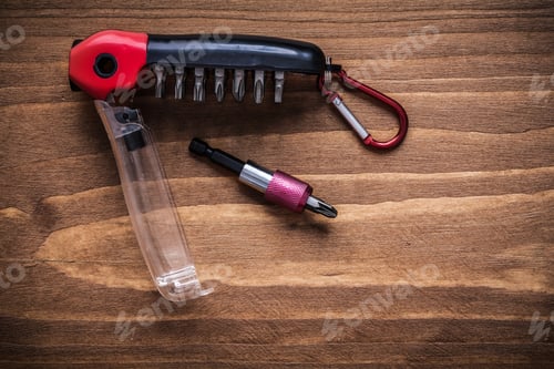 Preview: Interchangeable Turnscrew Bits In Toolbox On Wood Board Construction Concept.