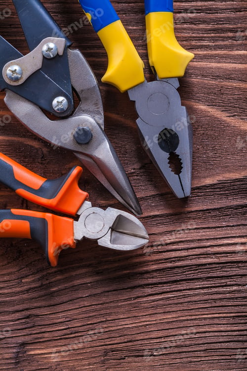 Preview: Vintage Brown Wooden Board With Pliers Nippers And Wire-Cutter Maintenance Concept