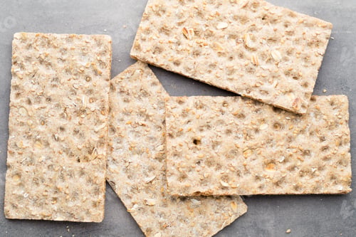 Preview: Stack Of Wholegrain Crispy Bread With Sunflower, Chia And Sesames Seeds