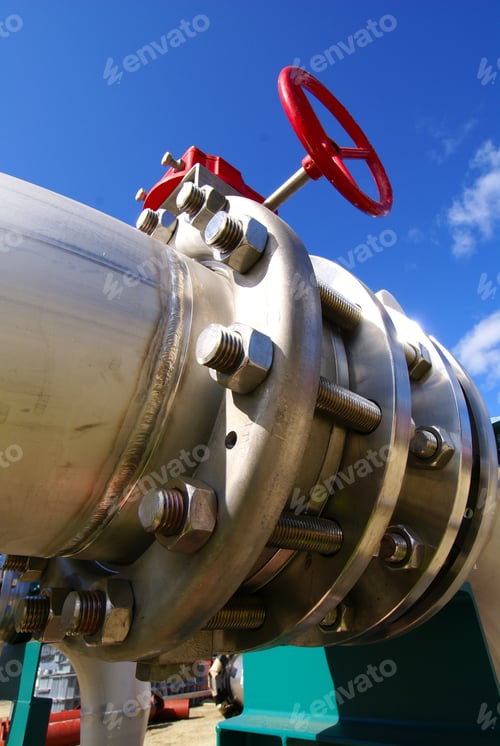 Preview: Industrial Pipelines On Pipe-Bridge Against Blue Sky