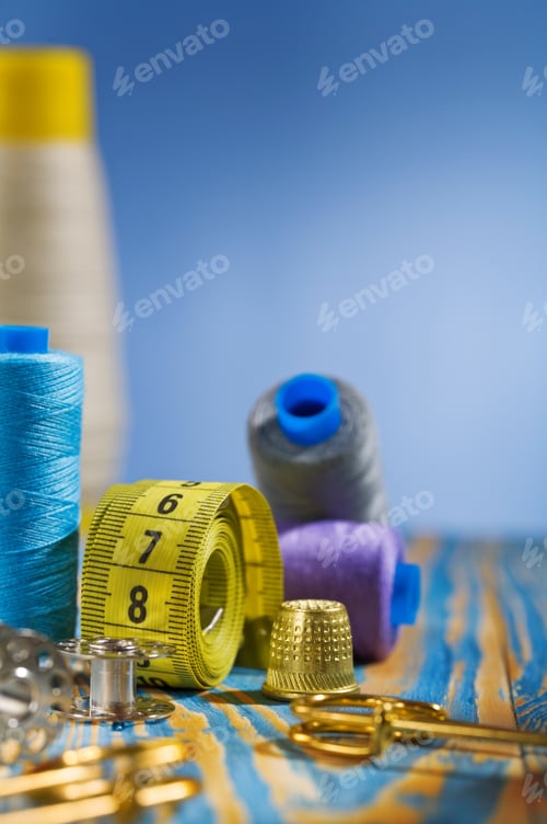 Preview: Sewing Items On Blue Background