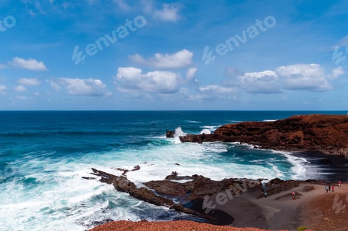 Preview: Beautiful Beach On The Island Of Lanzarote. Sandy Beach Surrounded By Volcanic Mountains / Atlantic