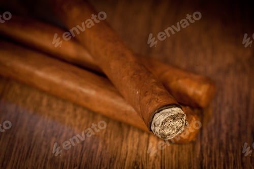Preview: Typical Havana Cigars On Wooden Background