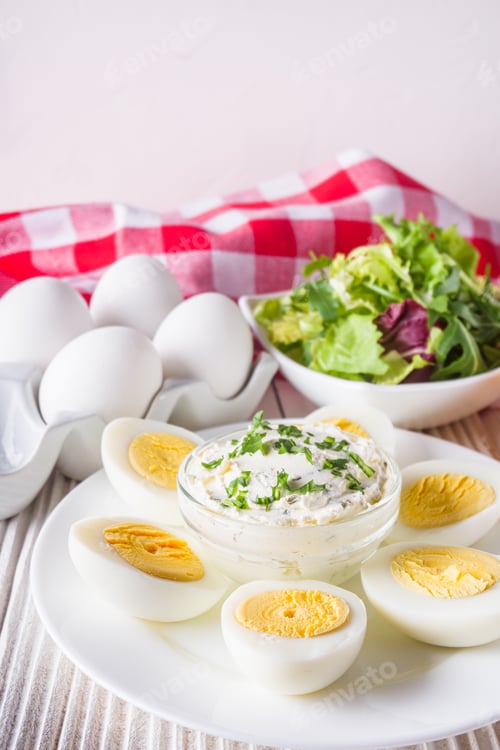 Preview: Boiled Chicken Eggs On A White Wooden Rustic Background