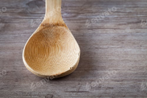 Preview: Empty Spoon On A Wooden Background