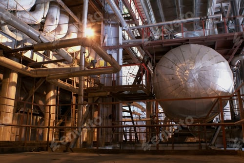 Preview: An Assortment Of Different Size And Shaped Pipes At A Power Plant.