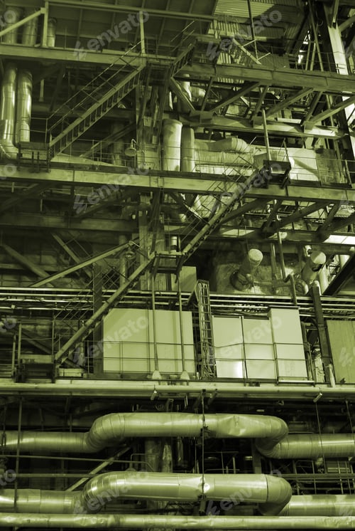 Preview: An Assortment Of Different Size And Shaped Pipes At A Power Plant