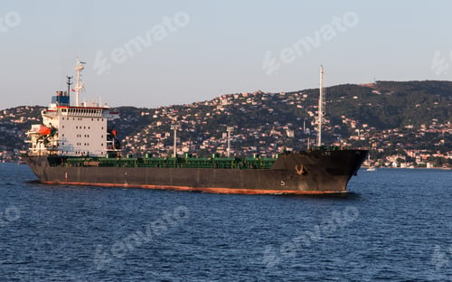 Preview: A Cargo Ship Carrying Goods Between Ports