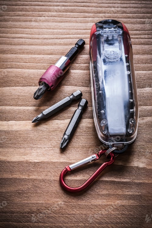 Preview: Tool Case With Replaceable Screwdriver Bits On Wooden Board.