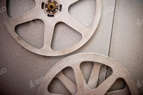 Preview: Movie Reels Part With Filmstrip Crossing On Projector Detail, 16 Mm Film Format In Vintage Colors