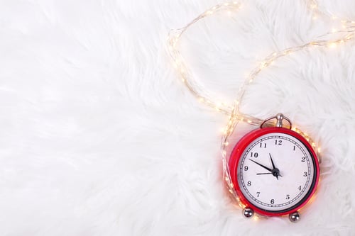 Preview: Red Clock - Symbol Of New Year On White Fur Background. Winter Holidays Concept. Time Concept. Top