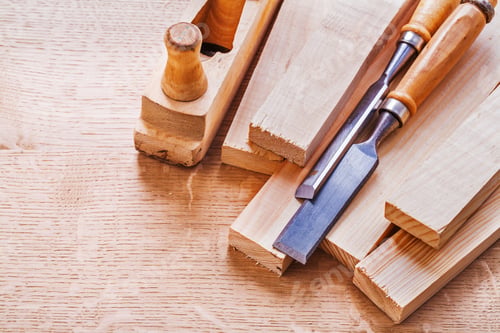 Preview: Chisels On Planks And Woodworkers Plane On Wooden Board