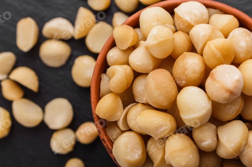 Preview: Delicious Macadamia Nuts On A Dark Stone Background