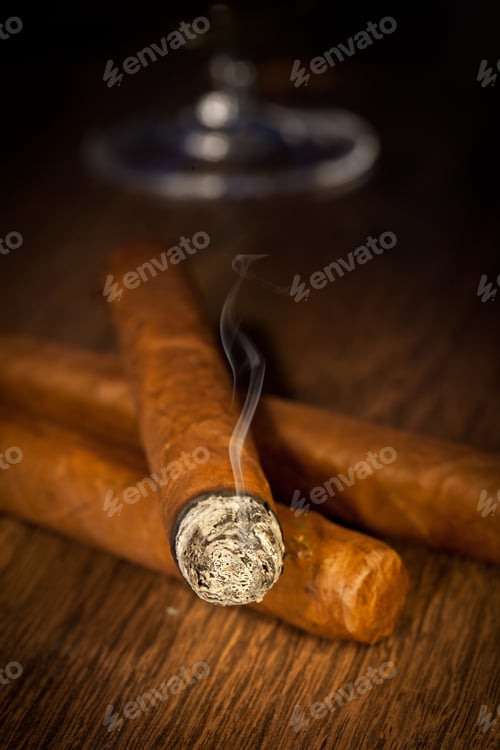 Preview: Typical Havana Cigars On Wooden Background