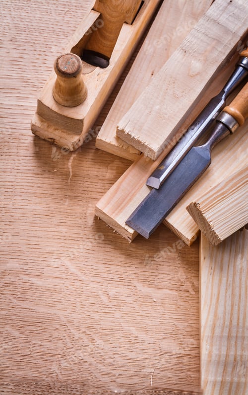 Preview: Woodworkers Plane Planks And Carpentry Chisels On Wooden Board