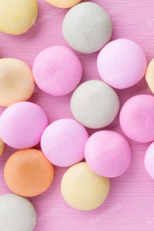 Preview: Small Round Candy-Colored Pastels On Pastel Background.