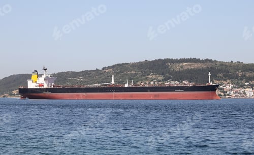 Preview: A Cargo Ship Carrying Goods Between Ports