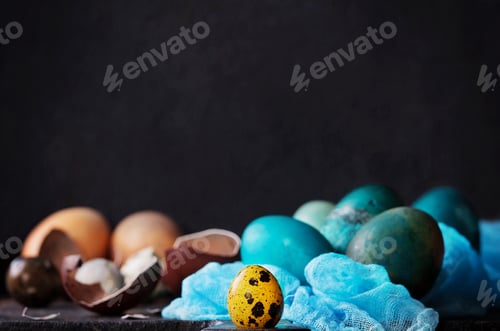 Preview: Traditional Colored Easter Eggs With Napkin Over Dark Background