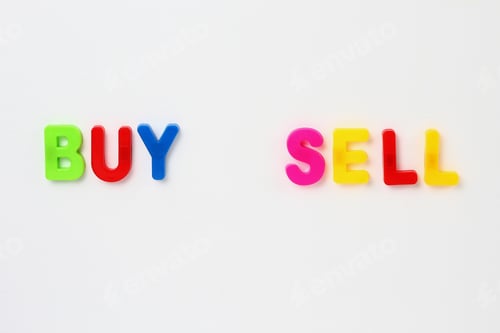 Preview: Text Made By Magnetic Letters On A White Wooden Background. Buy Sell. Business Success Motivation