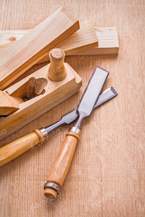 Preview: Compostion Of Woodworkers Plane And Carpentry Chisel Wooden Planks On Board Construction Concept