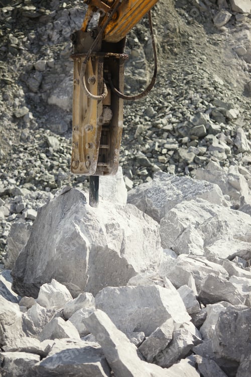 Preview: Crushing Boom Of A Hydraulic Breaker, Closeup, Crushes Rocks In A Quarry. Mining Industry.