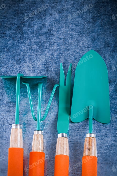 Preview: Composition Of Gardening Tools On Scratched Metallic Surface Agriculture Concept.