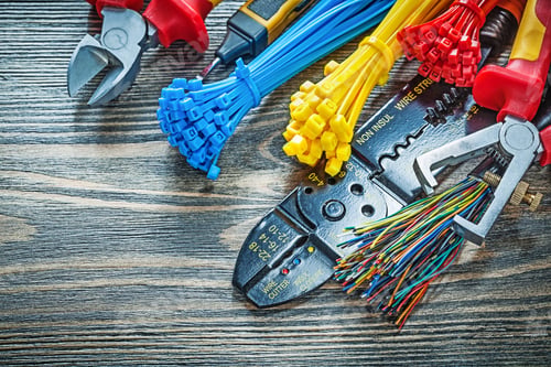 Preview: Electric Tester Wires Cable Ties Bolt Cutter Stripper Insulating Screwdriver On Wooden Board.
