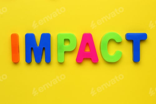 Preview: Text Made In Multicolored Magnetic Letters. Impact. Yellow Background