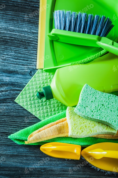 Preview: Assortment Of Household Cleaning Tools On Wooden Board.