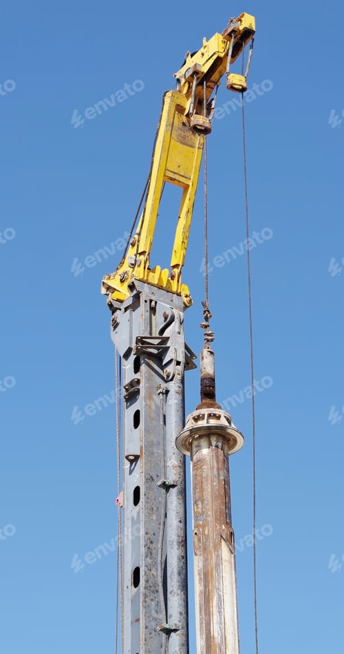 Preview: The Pile Driving Machine On A Background Blue Sky