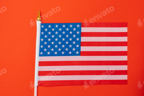Preview: American Small Flag On Colored Paper. Abstract Background.