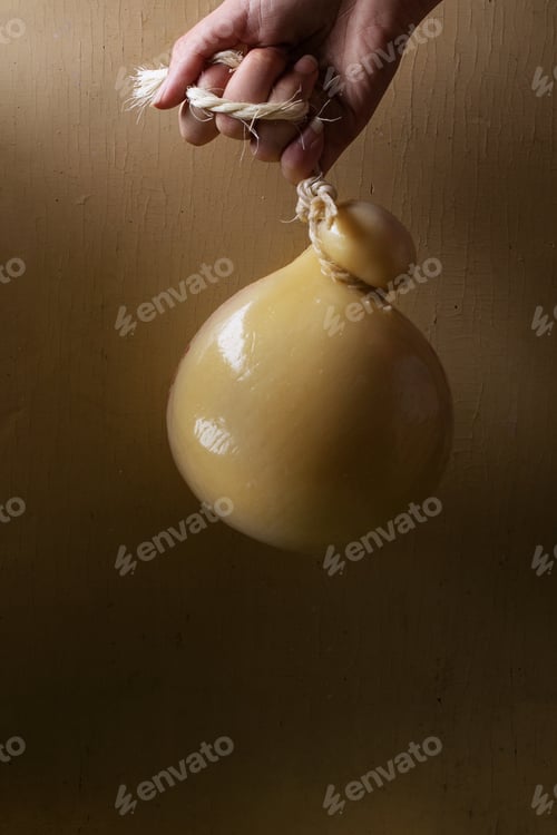 Preview: Caciocavalio Cheese Over Rustic Background