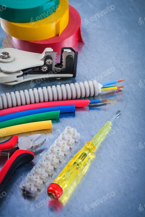 Preview: Collection Of Electrical Tools On Scratched Metallic Background Construction Concept.