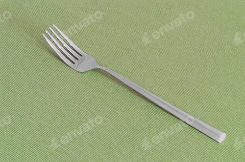 Preview: One Fork On A Green Sheet With Copy Space