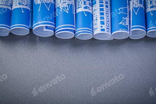 Preview: Blue Construction Drawings On Grey Background Maintenance Concept.