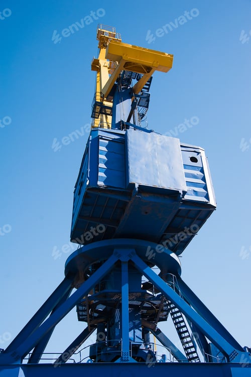Preview: Loading In Port. Floating Port Crane On Blue Sky Background. Chains And Hooks Hoist With Slings For
