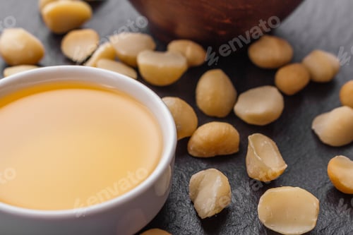 Preview: Delicious Macadamia Nuts On A Dark Stone Background