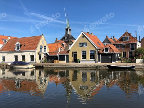 Preview: Houses Next To A Canal In The Old Town Of Makkum, Friesland, The Netherlands