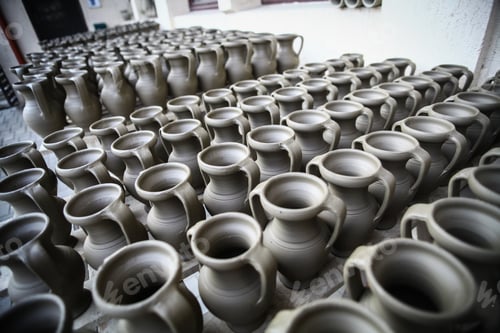 Preview: Color Image Of Some Pottery Left Out To Dry.