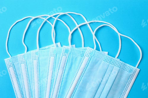 Preview: Medical Surgical Masks On A Classic Blue Background. Theme Of The Covid-19 Pandemic And Protective
