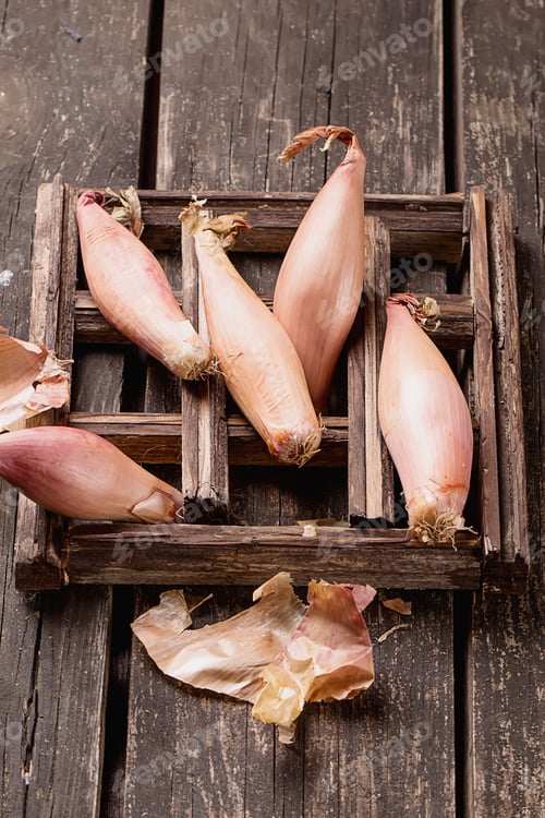 Preview: Shallot Onions On Rustic Wooden Board