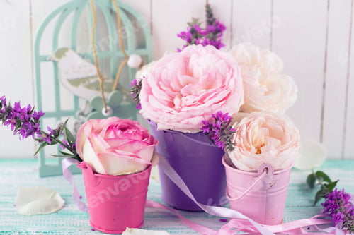 Preview: Postcard With Fresh Flowers In Buckets On Wooden Background.