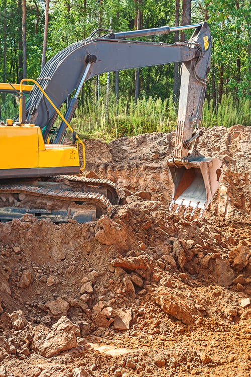 Preview: Exkavator Digging Clay Ground On Construction Site In Forest
