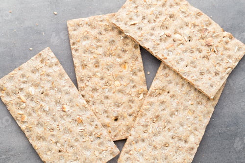Preview: Stack Of Wholegrain Crispy Bread With Sunflower, Chia And Sesames Seeds