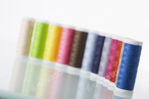Preview: Sewing Threads Isolated On White Background. Studio Shot
