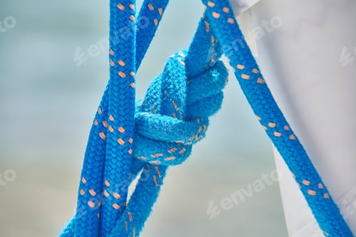 Preview: Detail Of A Sailor'S Knot Made On A Blue Intertwined Lanyard.