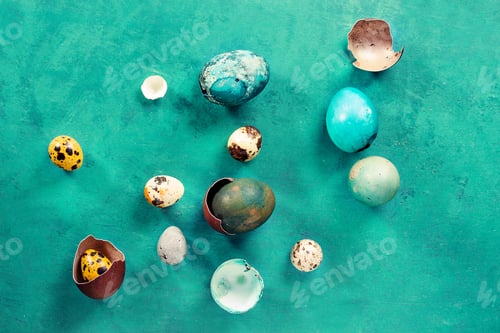 Preview: Traditional Colored Easter Eggs Over Blue Background. Top View