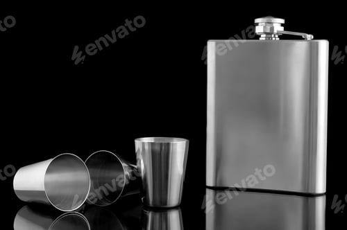 Preview: Hip Flask With Cups On A Black Background