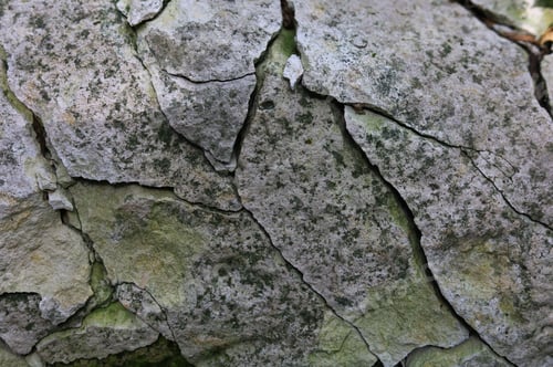 Preview: Rough Textured Surface Of Cracked Wild Stone. Extraction Of Material For Decorative Finishing